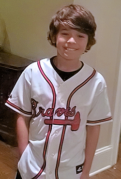 Gabriel, seen wearing his new Atlanta Braves jersey at his Atlanta home on December 17, 2014.